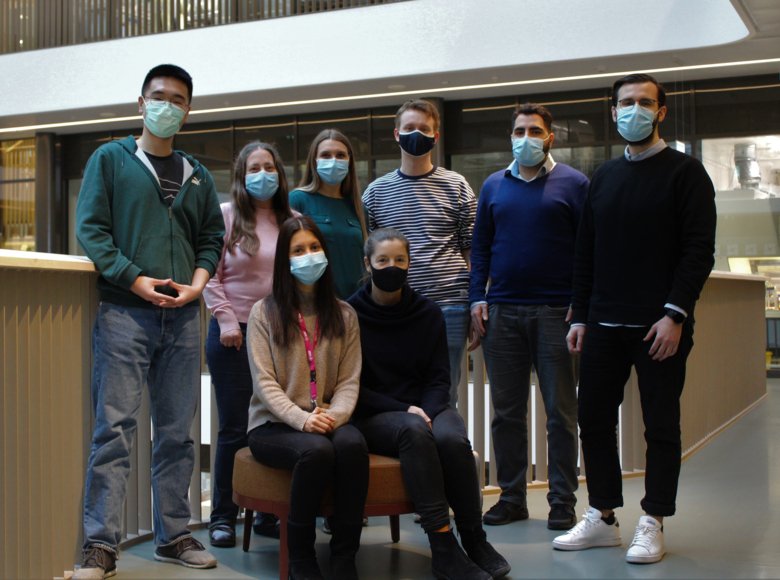 Kirsty Spalding's group with face masks posing togheter for the group picture.