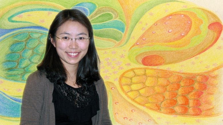 Photo of Ning Xu Landén. In the background: 'Healing blossom', a color pencil art by Dr. Xi Li.