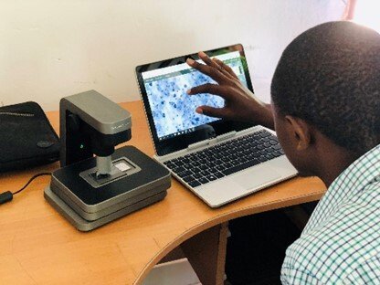 A man working by computer