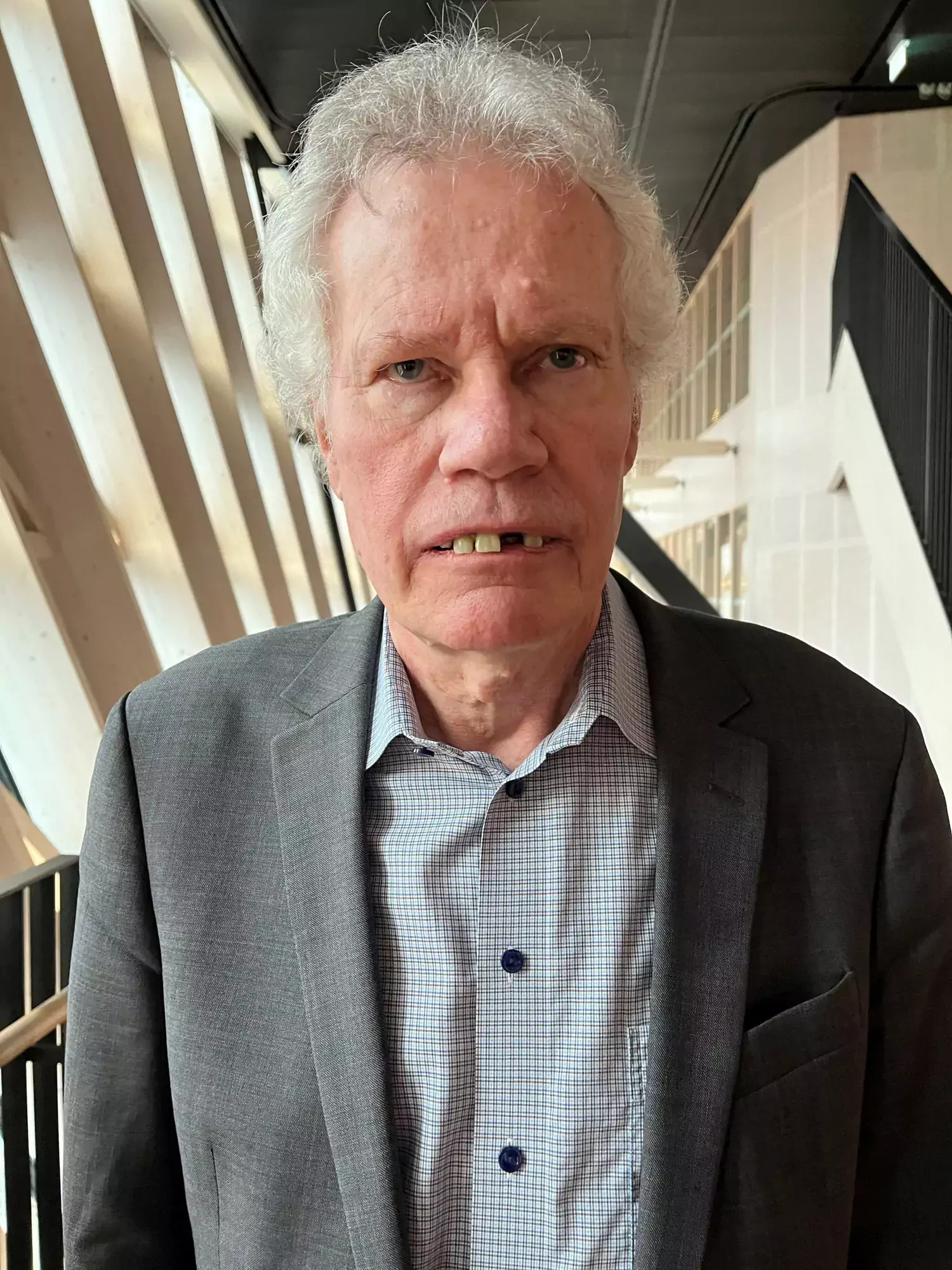 Professor Emeritus Björn Klinge wearing an artificial dental prosthesis. Photo: Ola Danielsson.