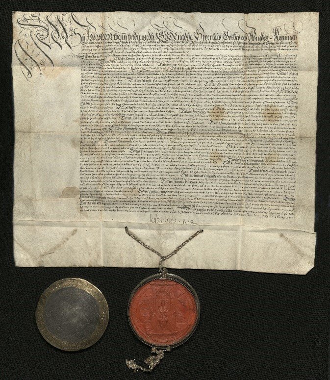 Bardskärareämbetets privilegiebrev från 1571, med Kung Johan III:s sigill och namnteckning