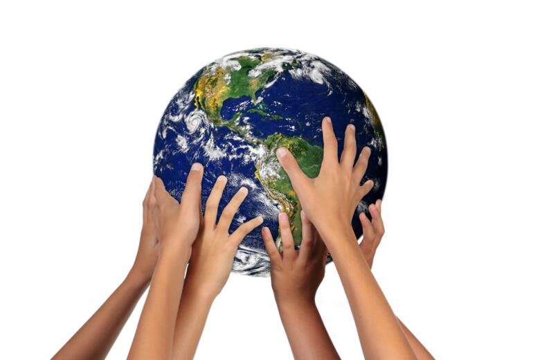 Hands holding the globe