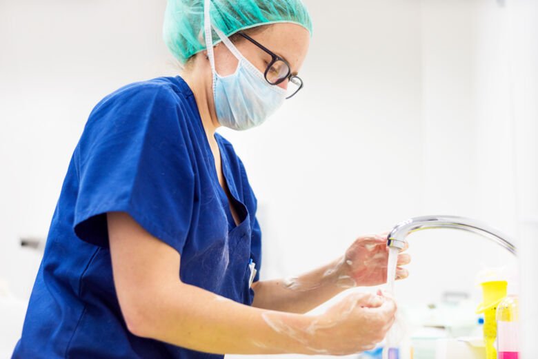 Photo of nurse washing hands.