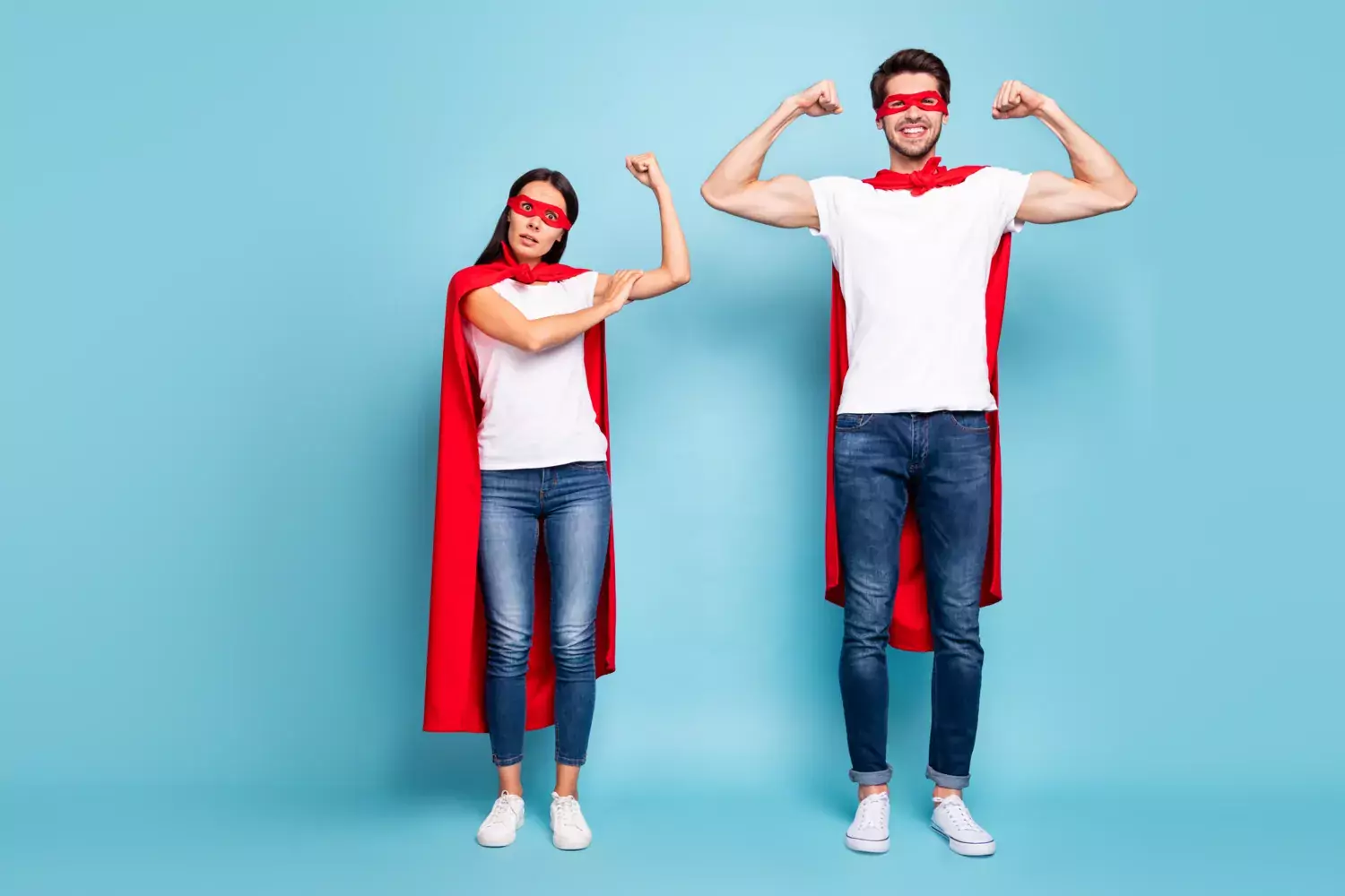 Picture of two parents dressed as superheroes.