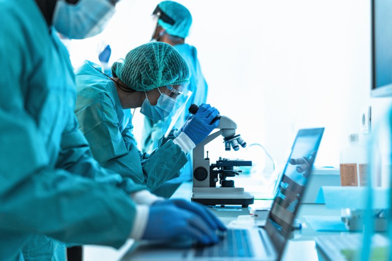 Medical workers doing analysis in laboratory