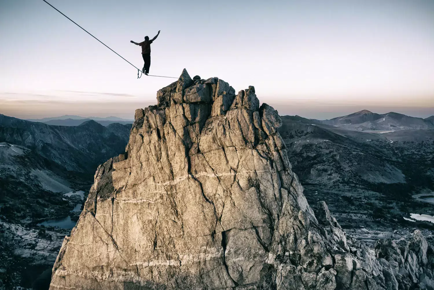 A person balancing on a line