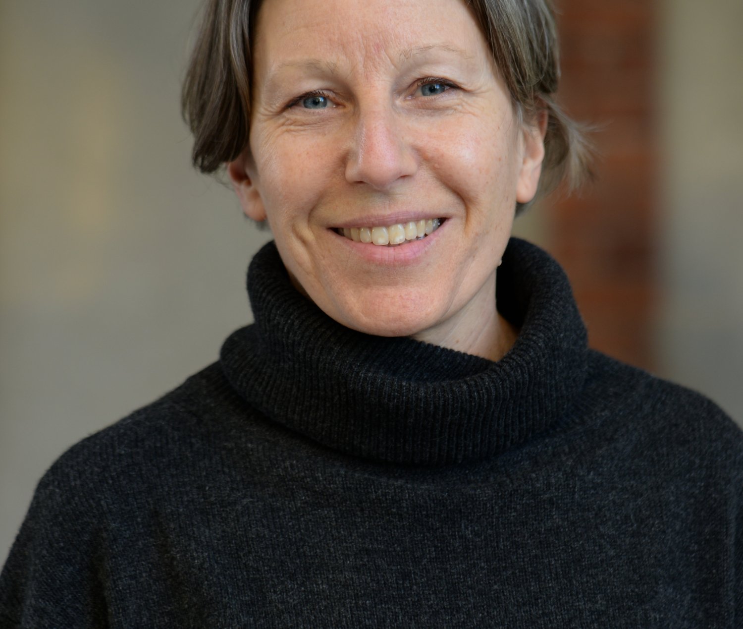 Profile photo of Helena Hervius Askling, a woman with short grey hair and a black jumper