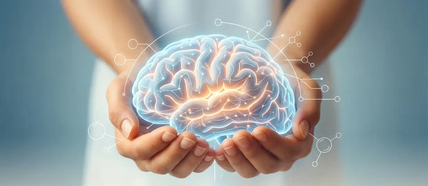 En hjärna som vilar i ett par händer