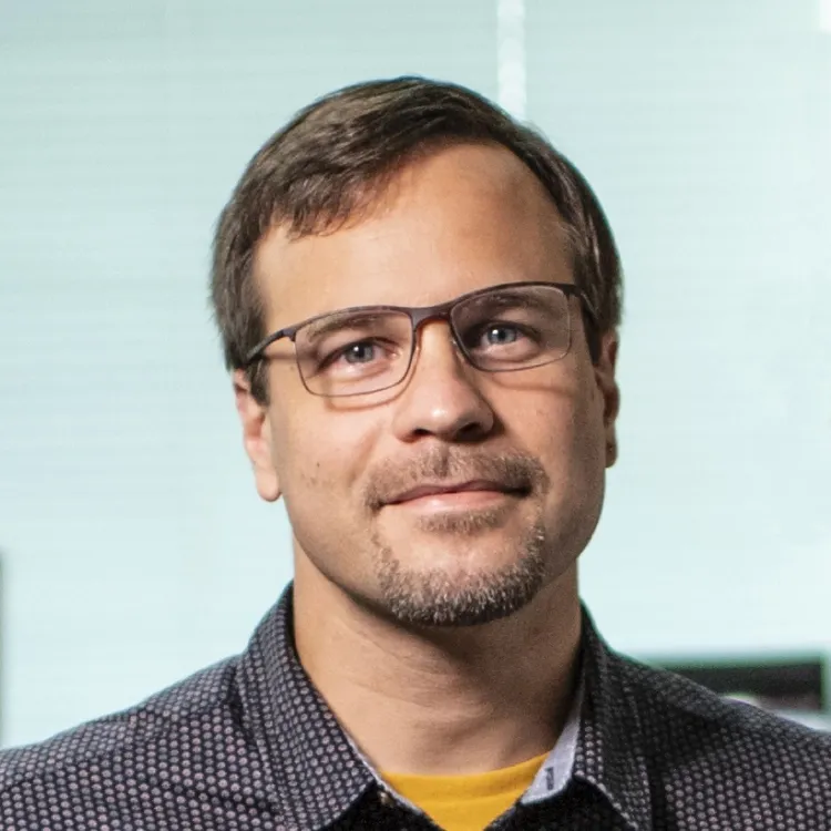 Portrait photo of Assistant professor Kenneth P. Olive, Columbia University.