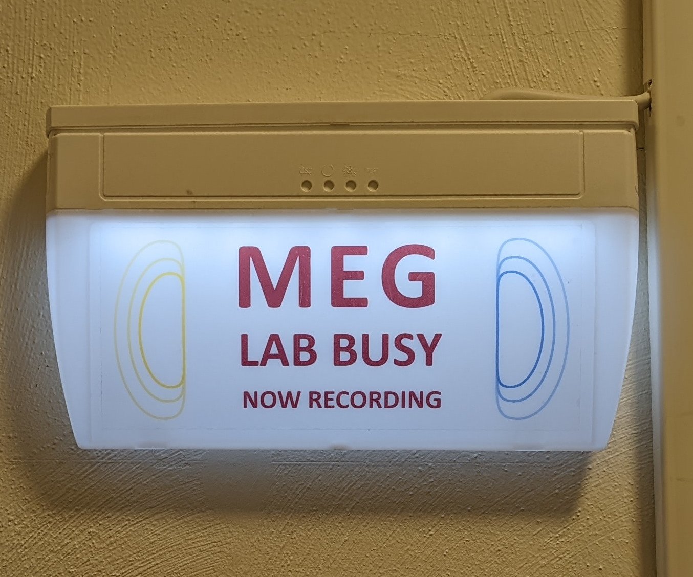 Sign indicating that recording is underway in the lab.