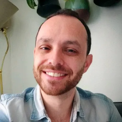 Portrait photo of a smiling man.