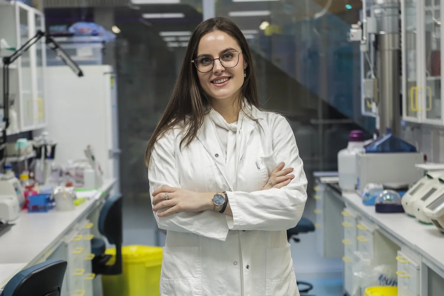 Portrait of woman in lab coat.
