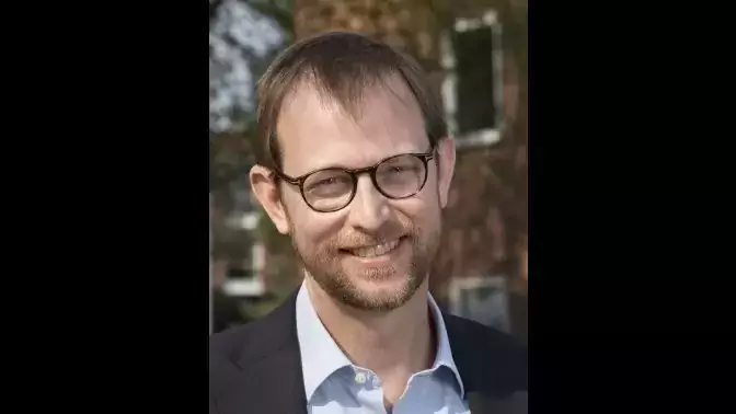 Profile photo of Petter Ljungman. A man with glasses, a light blue shirt and a jacket