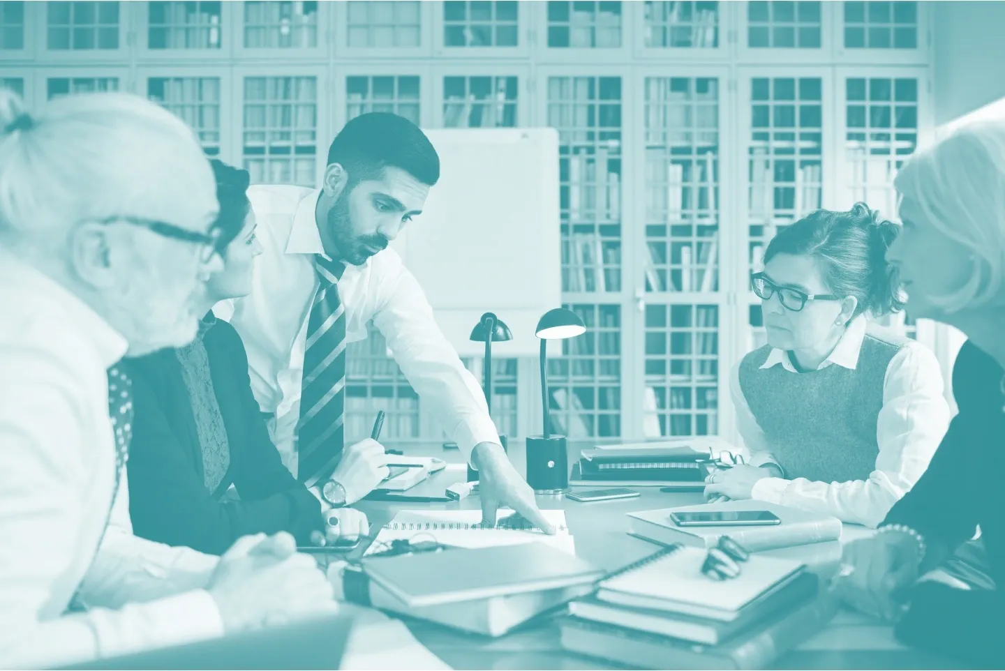 Five per physical meeting with notebooks.