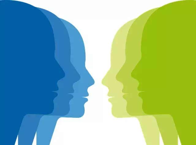 Illustration of blue and green faces opposite each other.