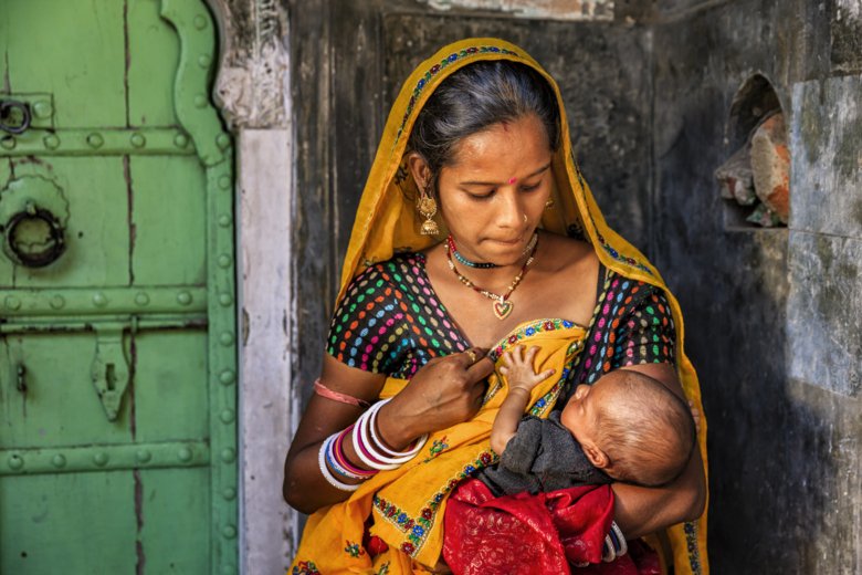 An Indian woman with newborn