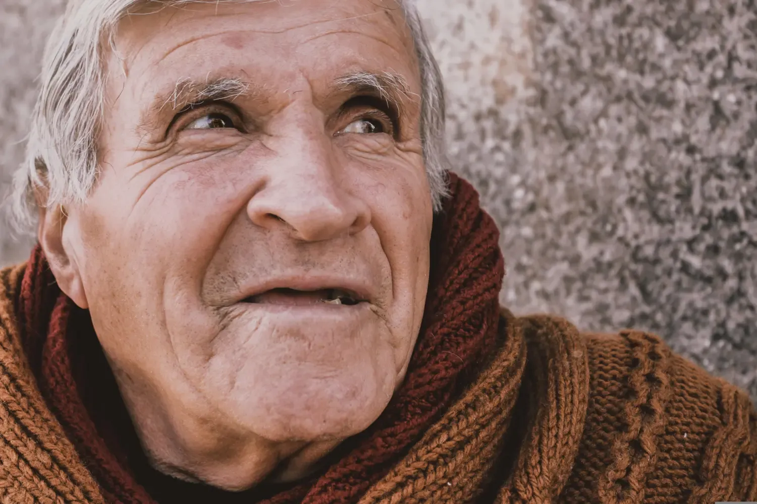 an old man with bad teeth