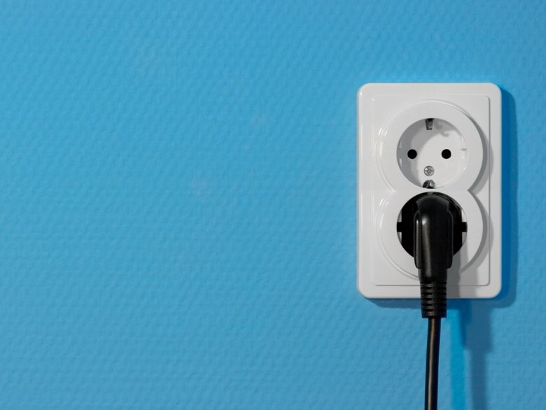 socket on blue wall