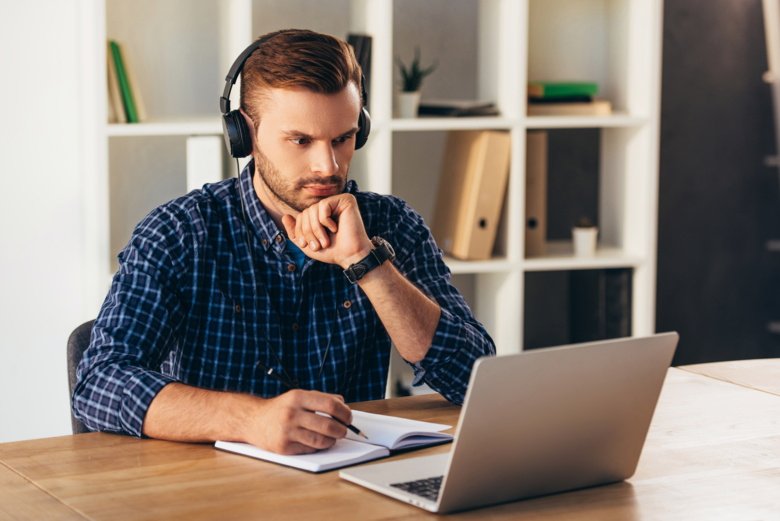 Man looking at his computer