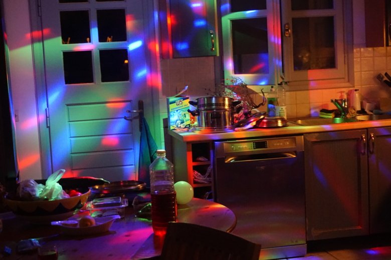 Room with multiple colours representing lasers used within the group, as a signature.