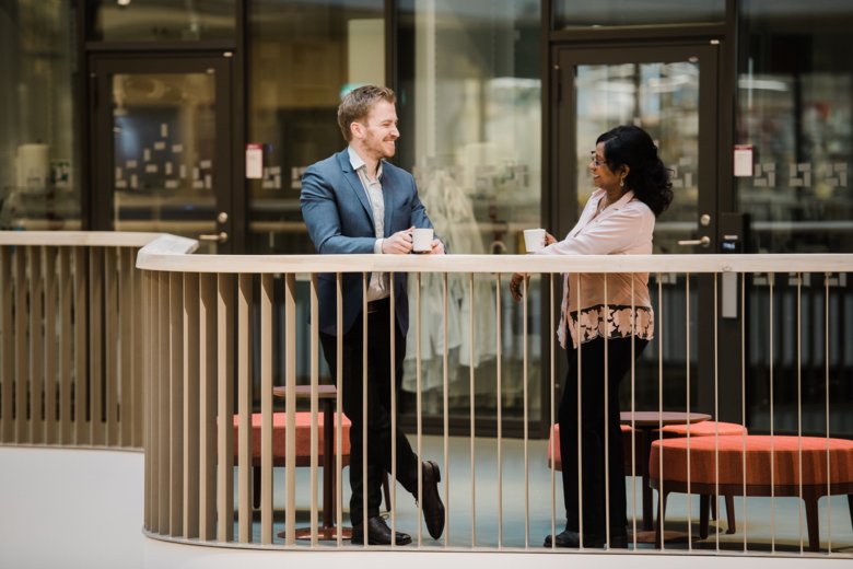 Two colleagues talking