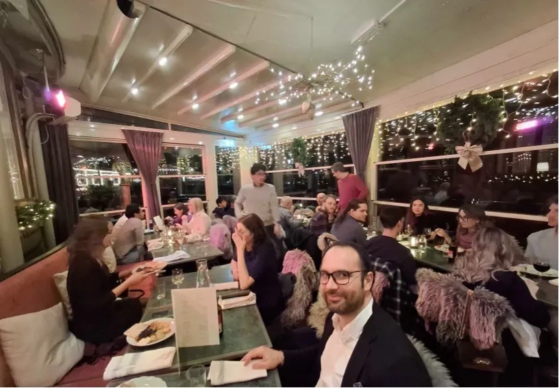 People enjoying a meal in a restaurant.