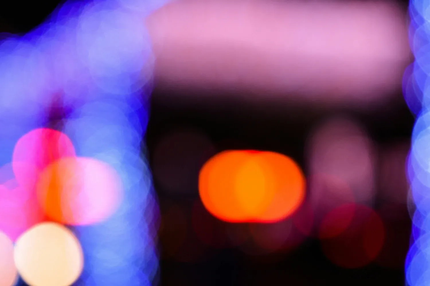 A so called Bokeh photography with several light sources who are out ot focus, and of different colors.