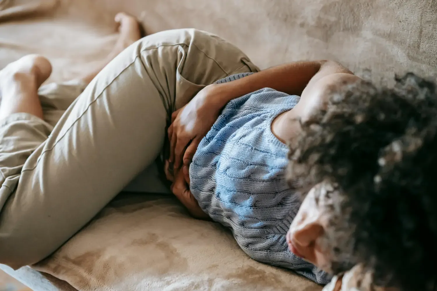 Woman with stomach pain