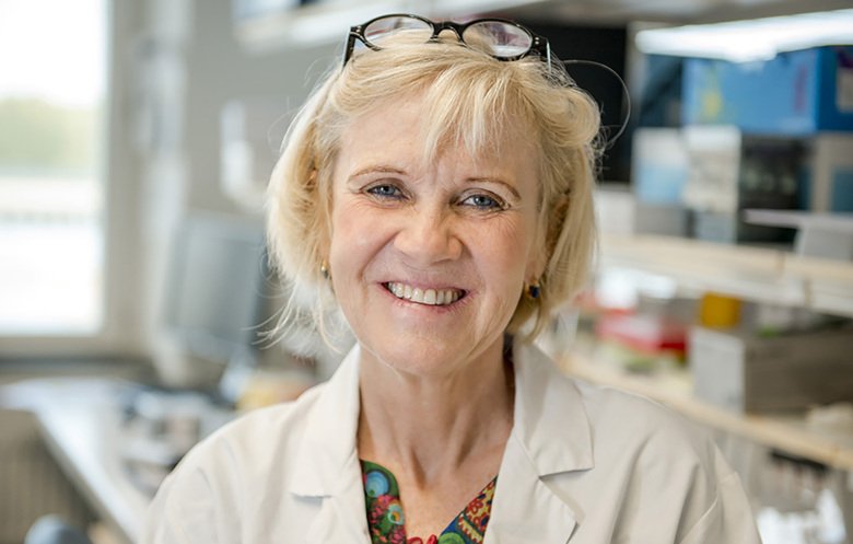 Portrait of Maria Bradley in laboratory environment.