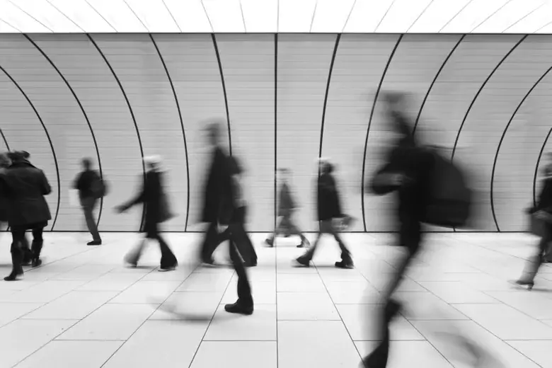People walking in a tunnel