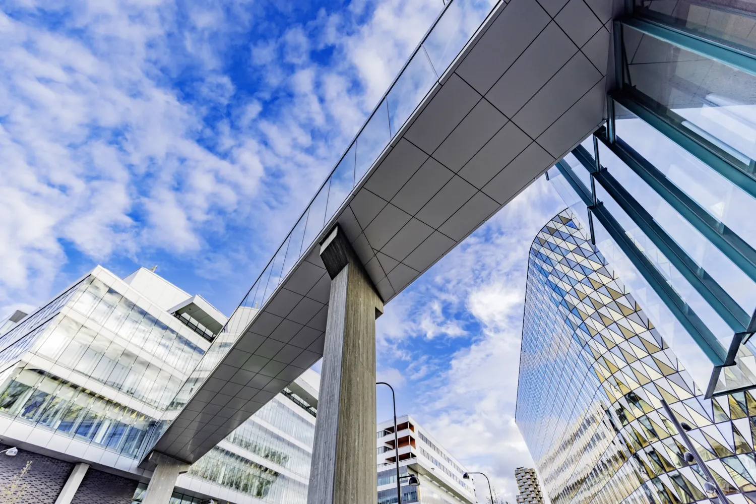 Aula Medica and Biomedicum at KI with a bridge to Karolinska University Hospital