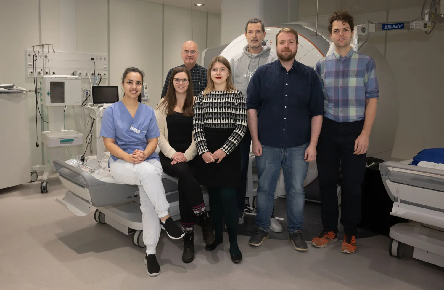 A group picture of seven researchers in hospital environment