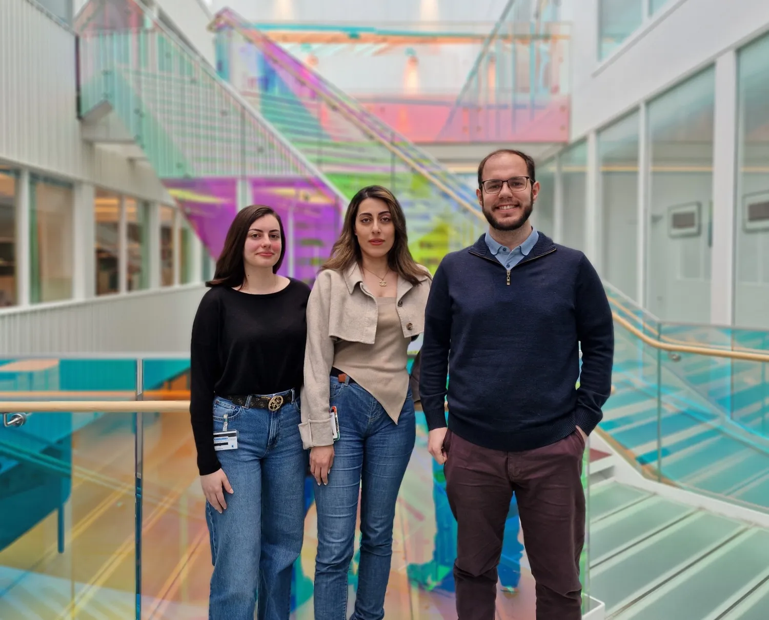 Group photo of three people.