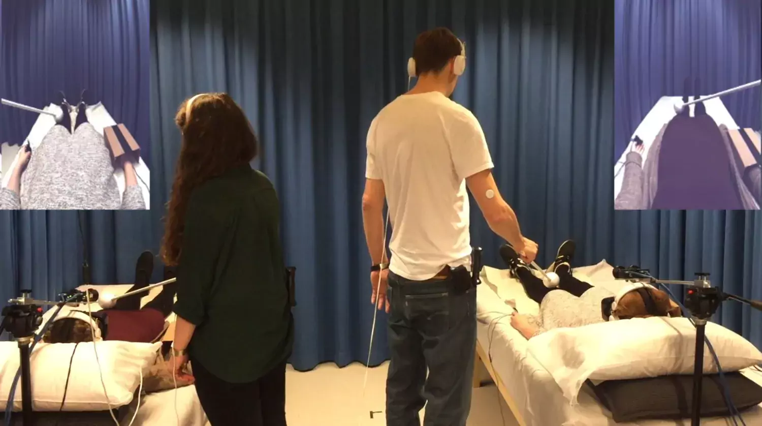 Set-up of perceptual illusion experiment with two persons on beds and two observers