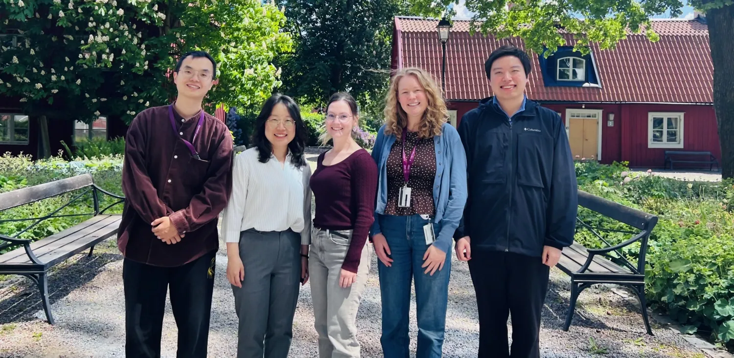 Five people in Jiayao Lei's research group outside Aula Medica
