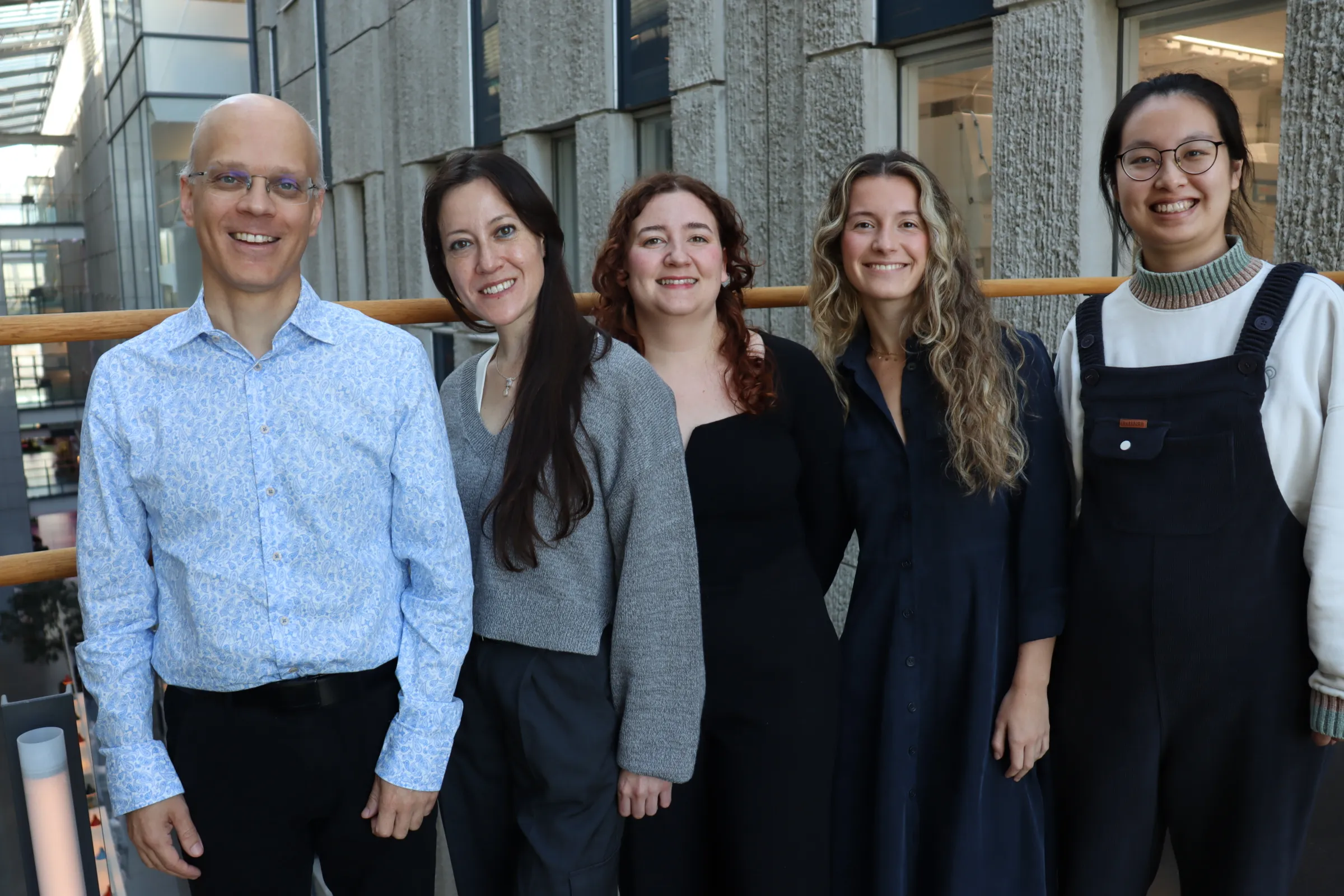 Group photo of five people.