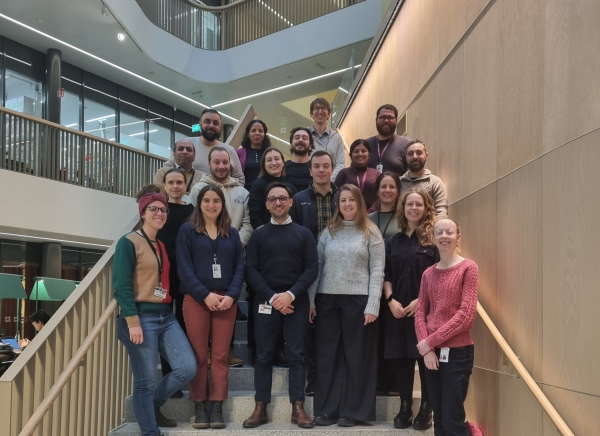 several people standing in the stairs