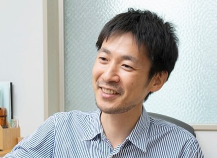 A portrait of a man looking away.