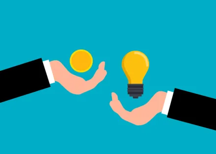Illustration of one hand holding a coin, giving it to another hand, holding a light bulb.