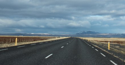 A desolate road in a barren environment