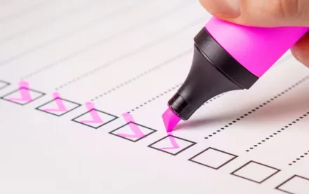 Pen checking boxes on a to-to-list.