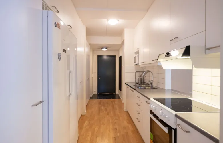 Picture of common kitchen and hallway in shared 4-bedroom apartment, KI Residence Flemingsberg.